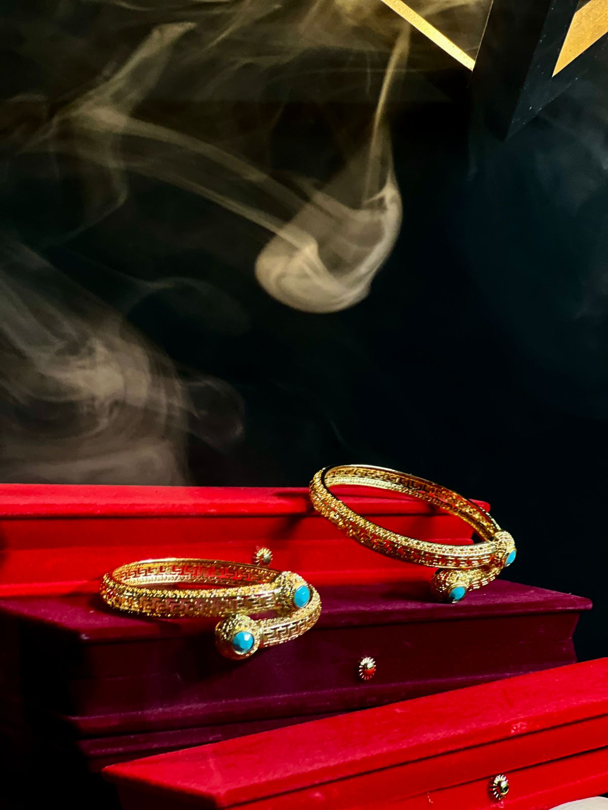 Intricately Carved Gold Bangles with Turquoise Stone Accents